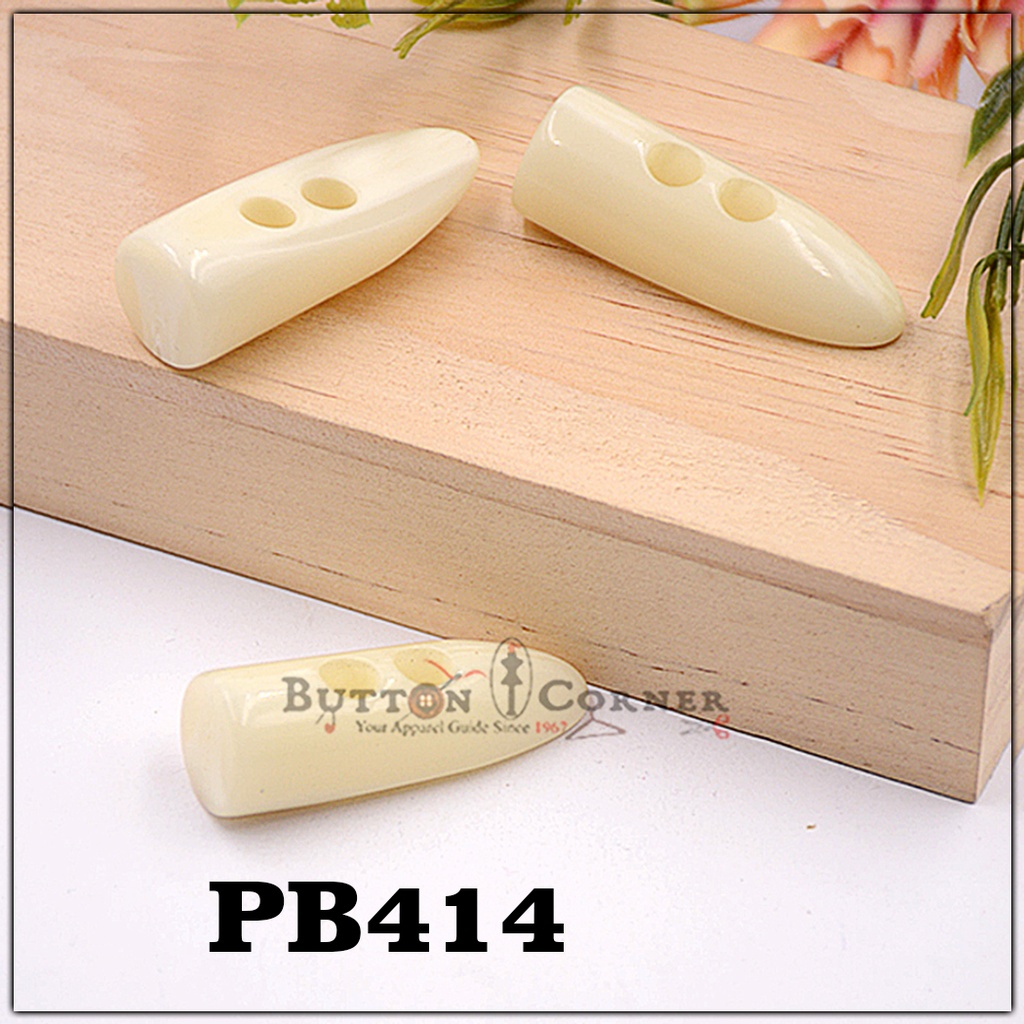 Bullet Shape 2 Hole Toggle Button