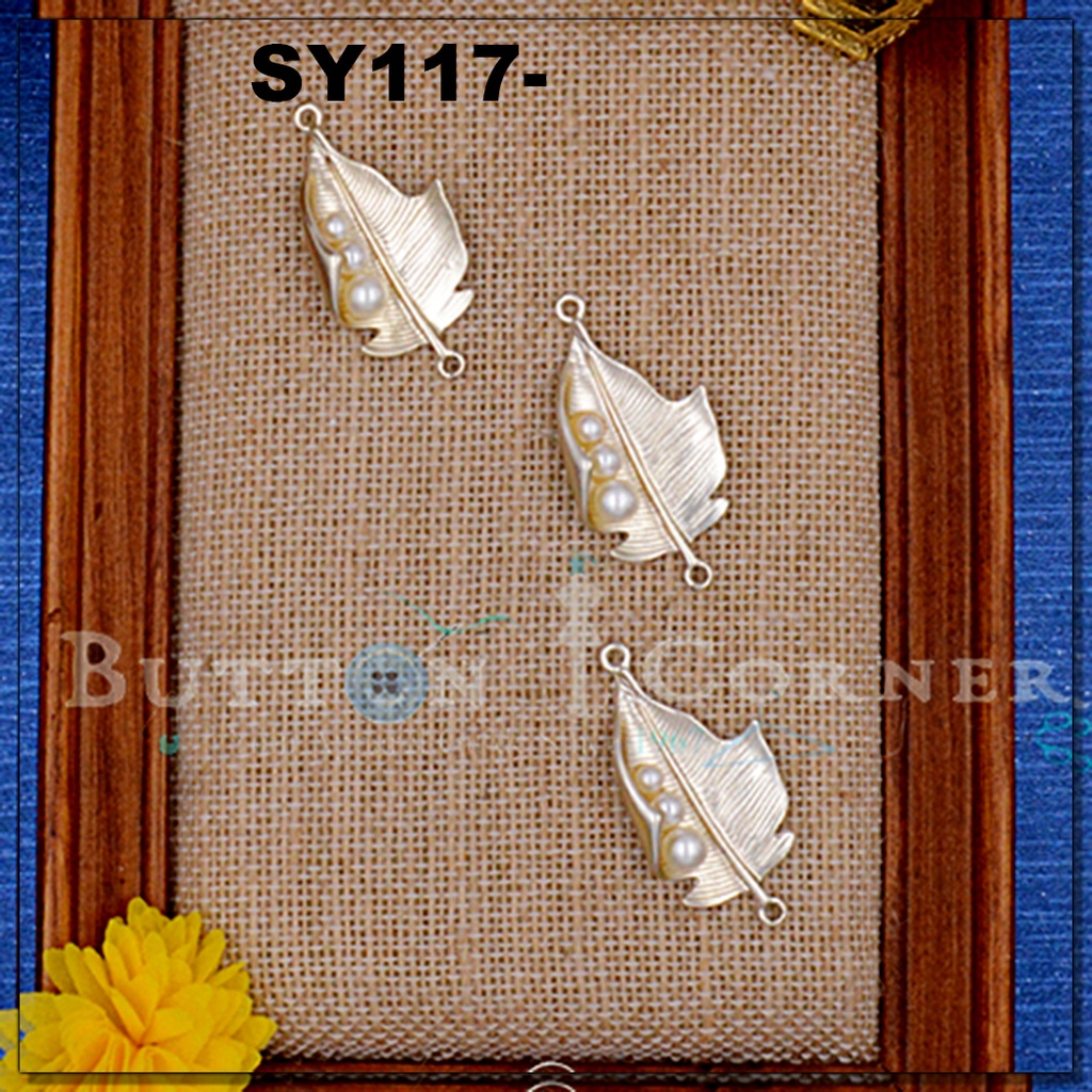Leaf silhouette adorned with a small, Lustrous Pearls Pendant