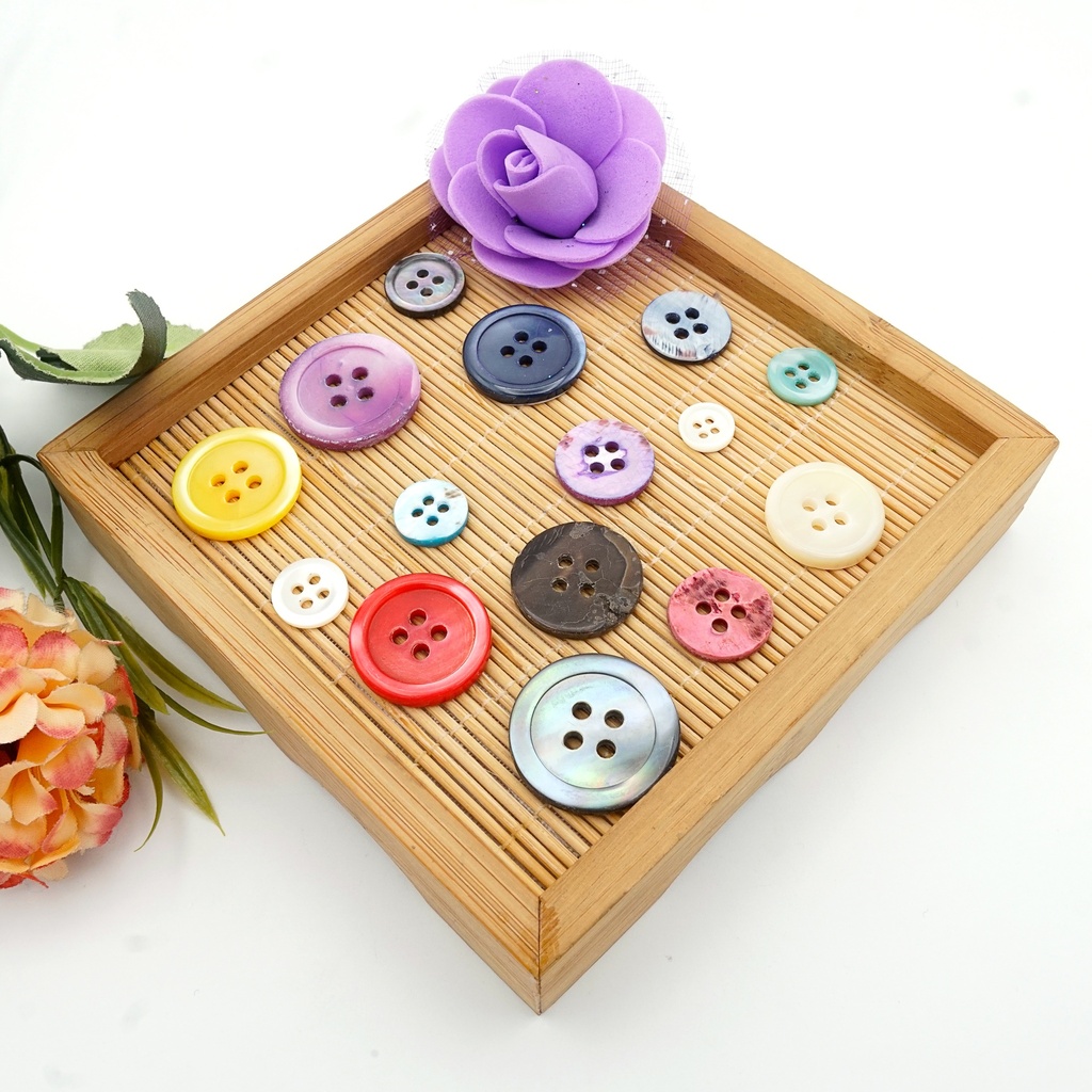 Mother-of-Pearl Coloured Wrangler Shape 4 Hole Shell Button