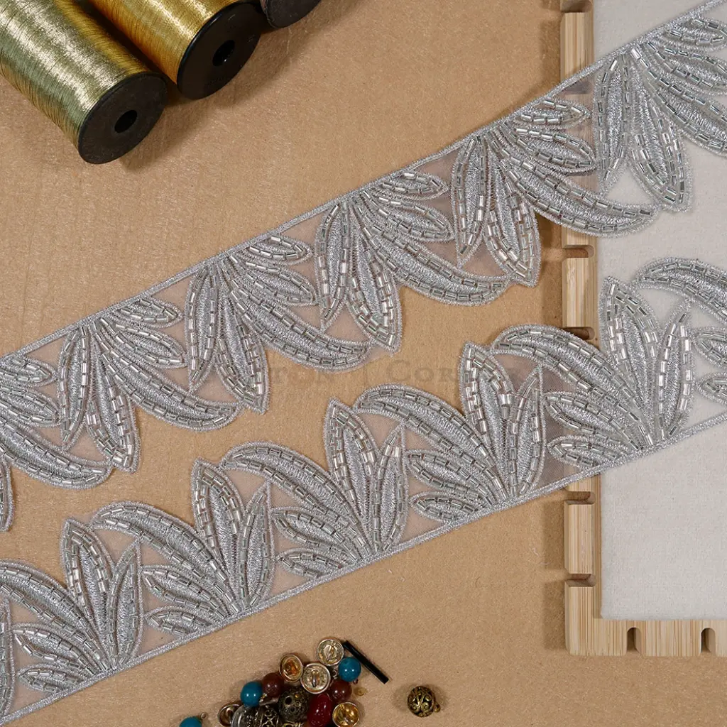 Metallic Yarn, Glass Beads, Net Lace