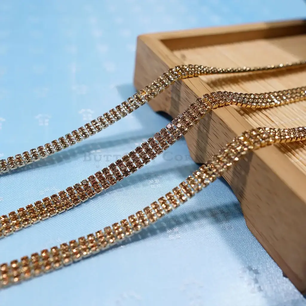 Gold Base Crystal Three Row Fancy Chain