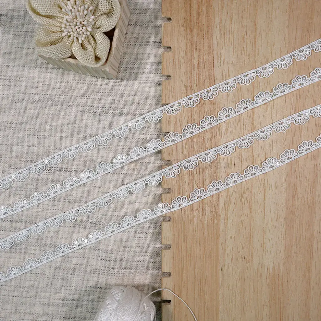 One Side Border Sequence Shuttle Lace