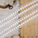 One Side Border Shuttle Lace with Floral Design