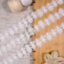 Floral Scallop Side Border Shuttle Lace