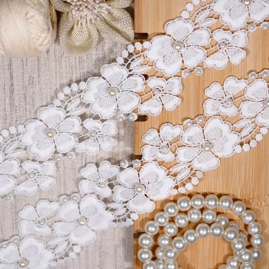 Blooming Flower Design with Decorative Accent Shuttle Lace with Pearl Embellishment