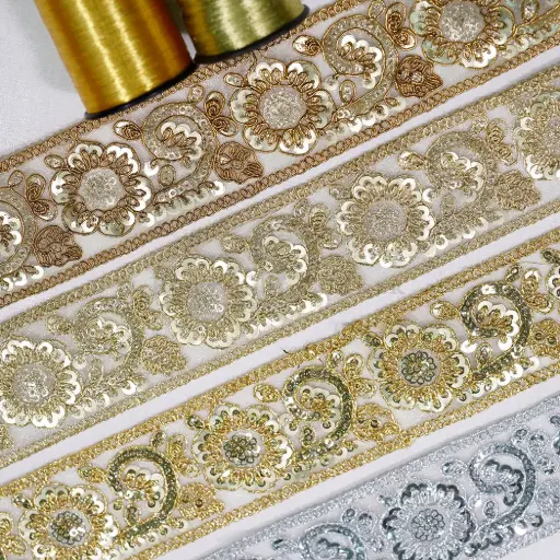 Geometric Floral Pattern Embellished with Sequence Fancy Metallic Yarn Lace