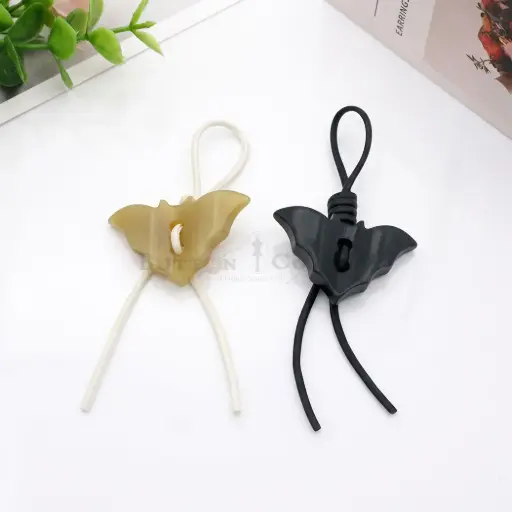 Irregular Surface Bat Design with Leather Knot Button