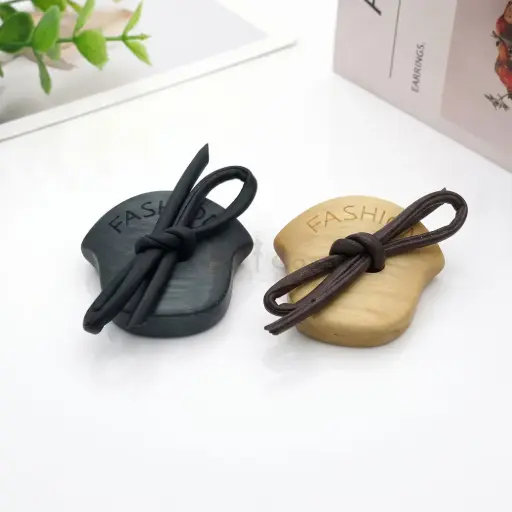 Fashion Embossed Shield Design Button with Leather Knot