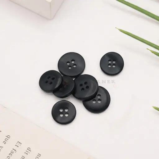 Irregular Shape Smooth Surface 4-Hole Suiting Button